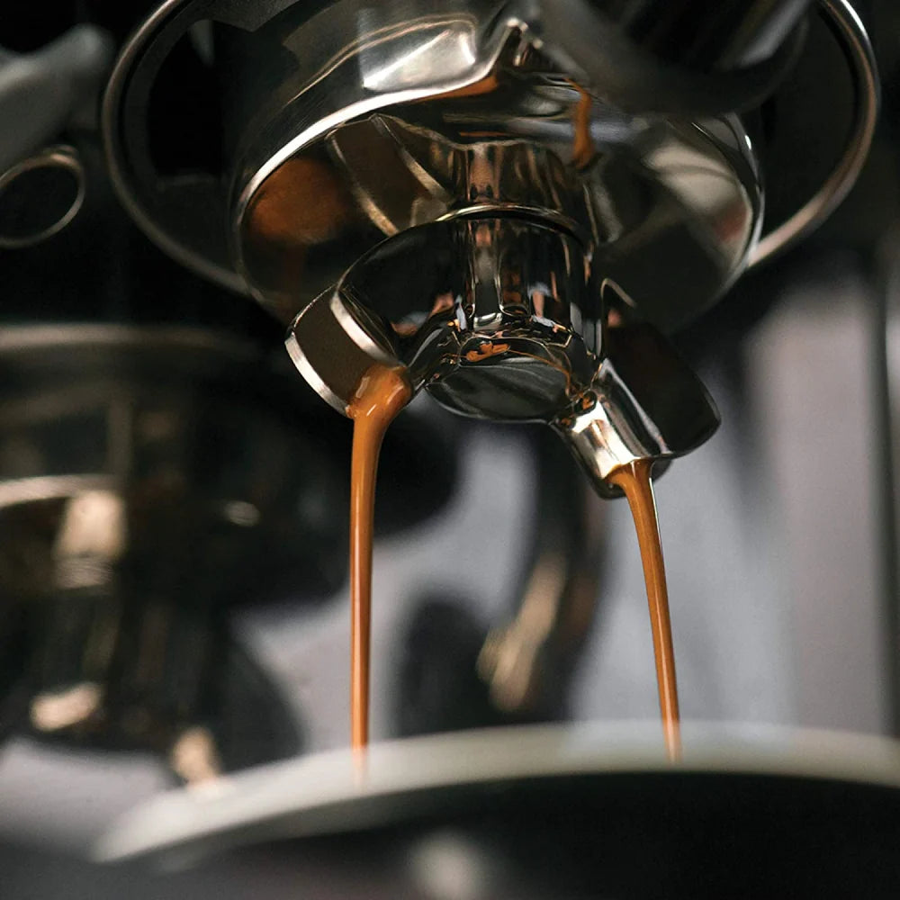 Sage Barista Touch SES880BSS Espresso Machine in Brushed Stainless Steel, close-up of espresso pouring