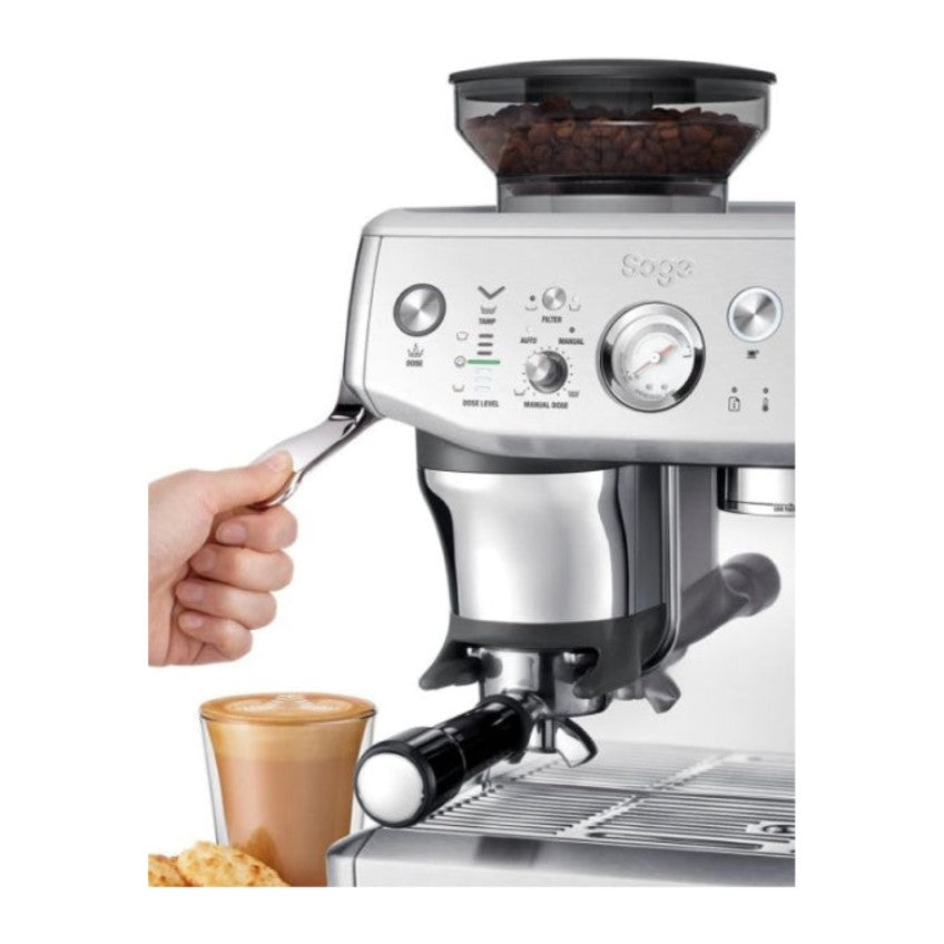 Sage Barista Express Impress SES876BSS Espresso Machine in Brushed Stainless Steel, assisted tamping in use