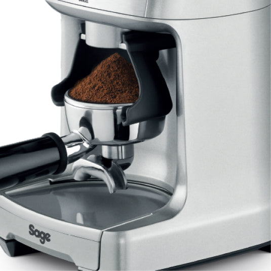 Sage the Dose Control Pro BCG600 Coffee Grinder in Silver, grinding into a portafilter