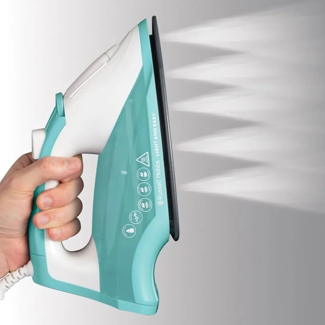 Russell Hobbs 26470, held in one hand with steam blowing out