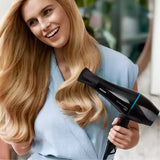 Philips DryCare Pro BHD272/00 Hair Dryer in Black, in use