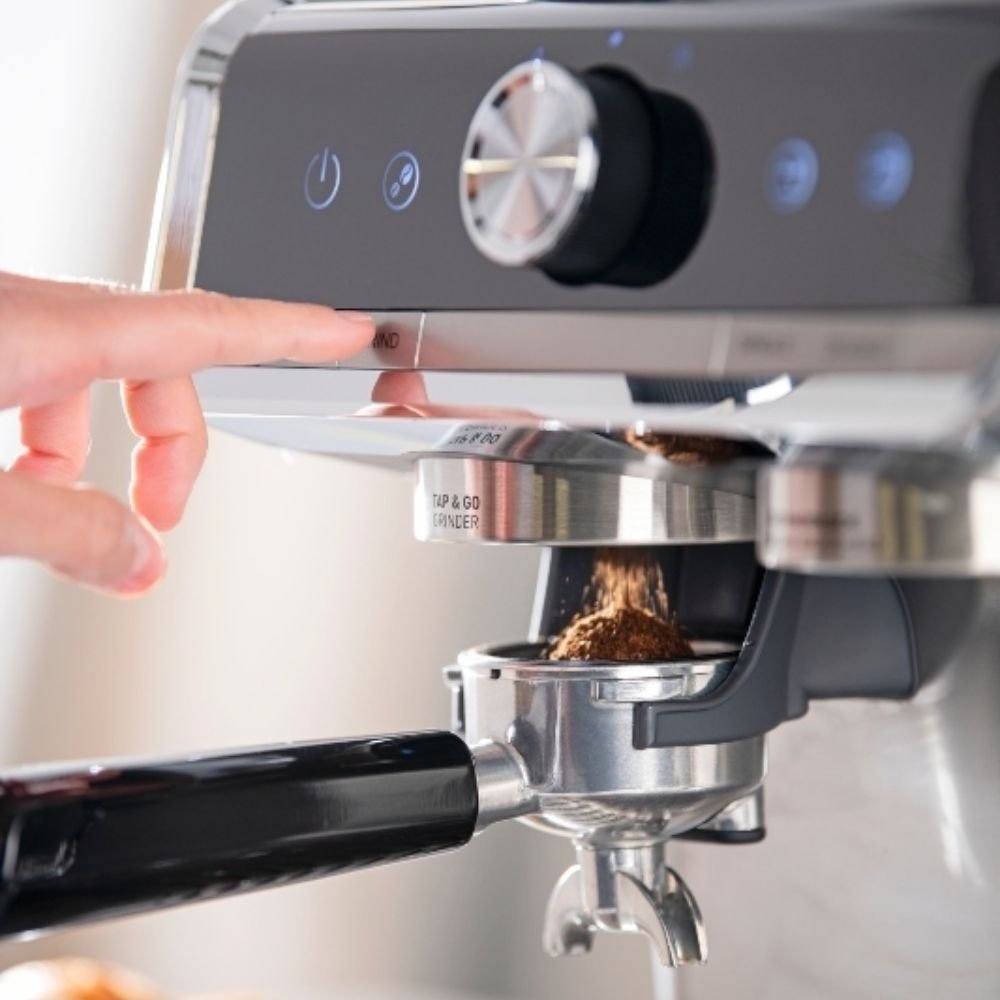 Izzy IZ-6007 Espresso Machine, built-in grinder filling the portafilter close-up