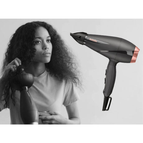 BaByliss Smooth Pro 2100 6709DE Hair Dryer, in use
