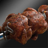 Broil King Baron 590 876283 Gas Barbecue, roasting a chicken on the rotisserie