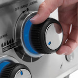 Broil King Regal S 520 886653 Built-In Gas Barbecue, turning an illuminated control knob
