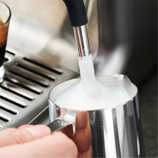 Gastroback Design Espresso Barista Pro 42616 Espresso Machine, frothing milk with the steam wand