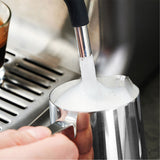 Gastroback Design Espresso Barista Pro 42616 Espresso Machine, frothing milk with the steam wand