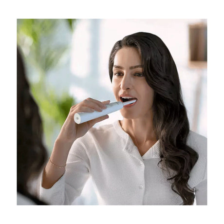Philips Sonicare 1100 Series HX3641/02 Electric Toothbrush, in use