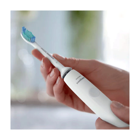 Philips Sonicare 1100 Series HX3641/02 Electric Toothbrush, held in the hand