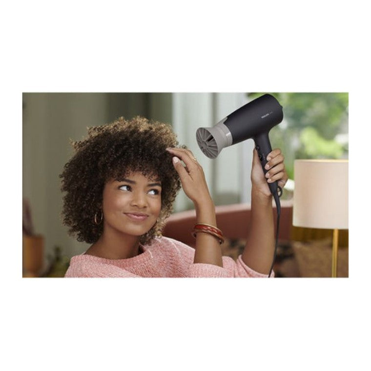 Philips 3000 Series BHD341/30 Hair Dryer in Black, in use