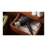 Philips 3000 Series BHD341/30 Hair Dryer in Black, in a drawer