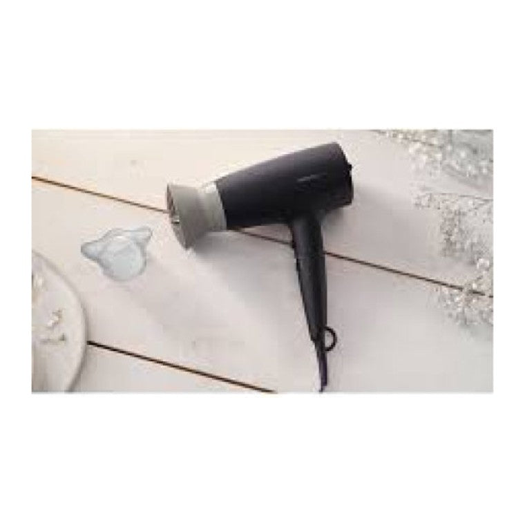 Philips 3000 Series BHD341/30 Hair Dryer in Black, in a room setting