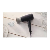 Philips 3000 Series BHD341/30 Hair Dryer in Black, in a room setting