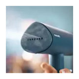 Philips 3000 Series STH3000/20 Garment Steamer in Blue, releasing steam