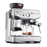 Sage Barista Express Impress SES876BSS Espresso Machine in Brushed Stainless Steel, front view with a coffee