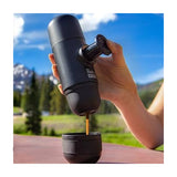 Wacaco Minipresso NS Portable Espresso Maker, making an espresso outdoors