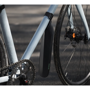 Ass Savers Speed Mullet Regular black front clip-on mudguard mounted on a bicycle downtube.