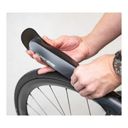 Ass Savers Win-Wing 2 Gravel rear mudguard in Black Dots design, mounted on the seat stays of a gravel bike.