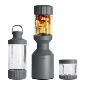 Beast Mega 1200 Plus B12MH Blender in Charcoal, blender with fruit beside two other vessels