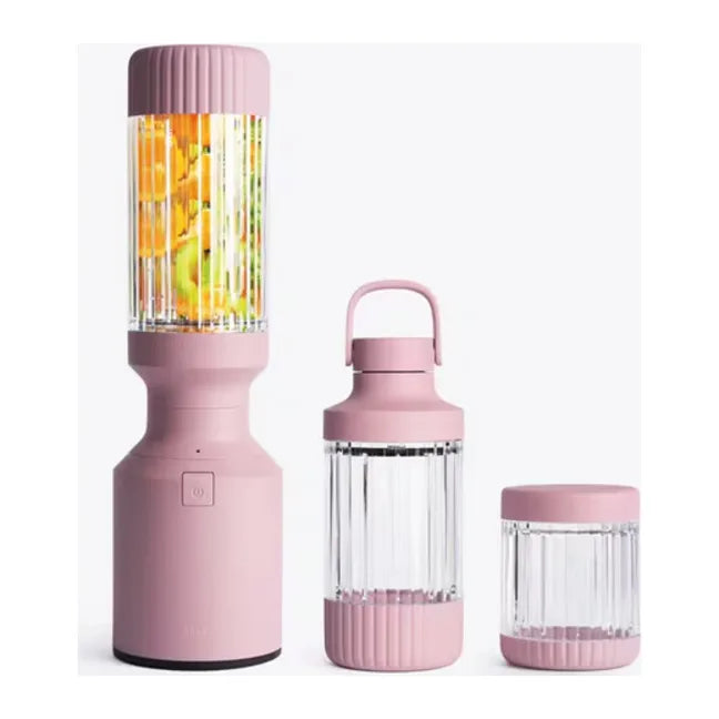 Beast Mighty B85MH Personal Blender in Lilac, base with tall vessel full of fruit beside two smaller vessels