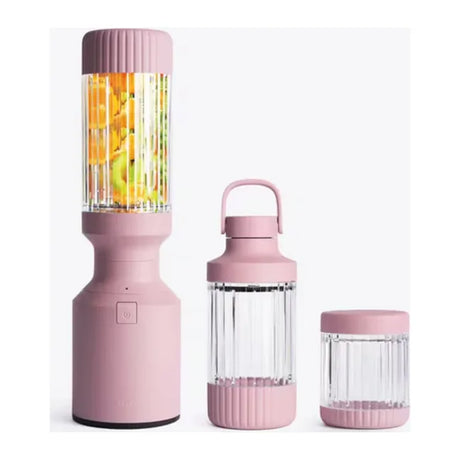 Beast Mighty B85MH Personal Blender in Lilac, base with tall vessel full of fruit beside two smaller vessels