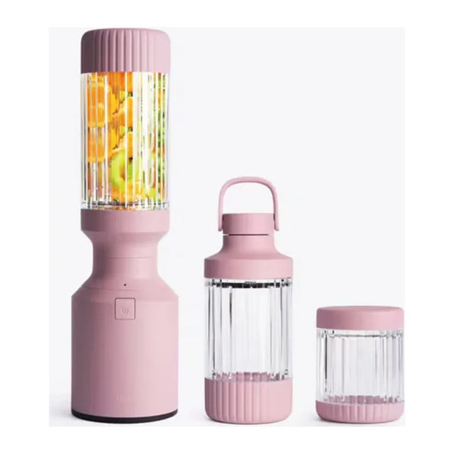 Beast Mighty B85MH Personal Blender in Lilac, base with tall vessel full of fruit beside two smaller vessels