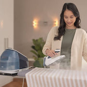 Braun CareStyle 5 IS5245BL steam generator iron in blue with ergonomic handle and large 2L water tank.