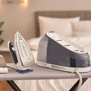Braun CareStyle 5 IS5245BL steam generator iron in blue with ergonomic handle and large 2L water tank.