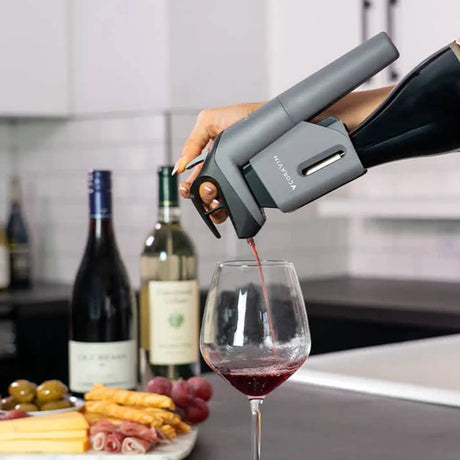 Coravin Timeless 10016 Wine Preservation System in Black, in use