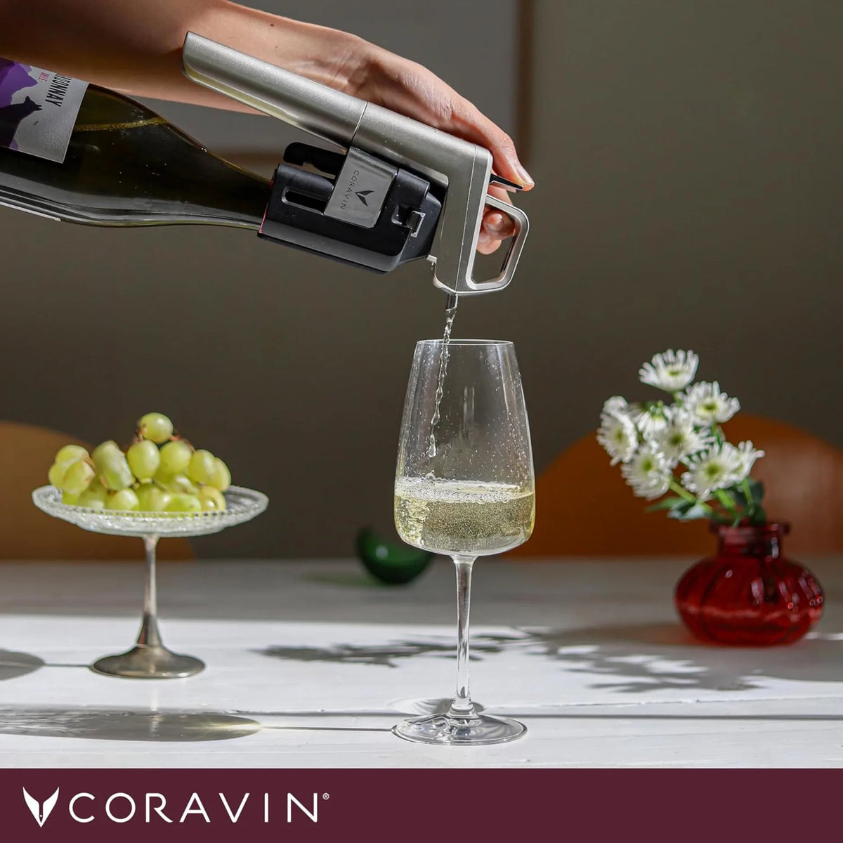 Coravin Timeless 10043 Wine Preservation System in Silver, in use