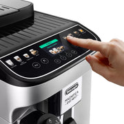 De'Longhi Magnifica Evo Next automatic coffee machine in silver and black featuring the color TFT display and milk carafe.
