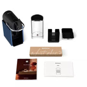 De'Longhi Nespresso Pixie capsule coffee machine in Electric Blue featuring industrial metal side panels and a slim profile.