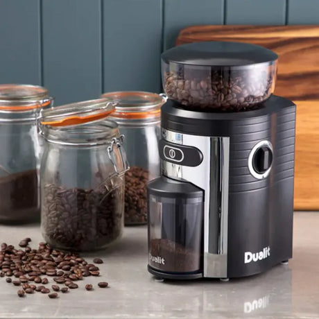 Dualit 75015 in Black, on a worktop beside jars of coffee beans