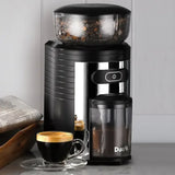 Dualit 75015 in Black, beside a cup of espresso and a newspaper