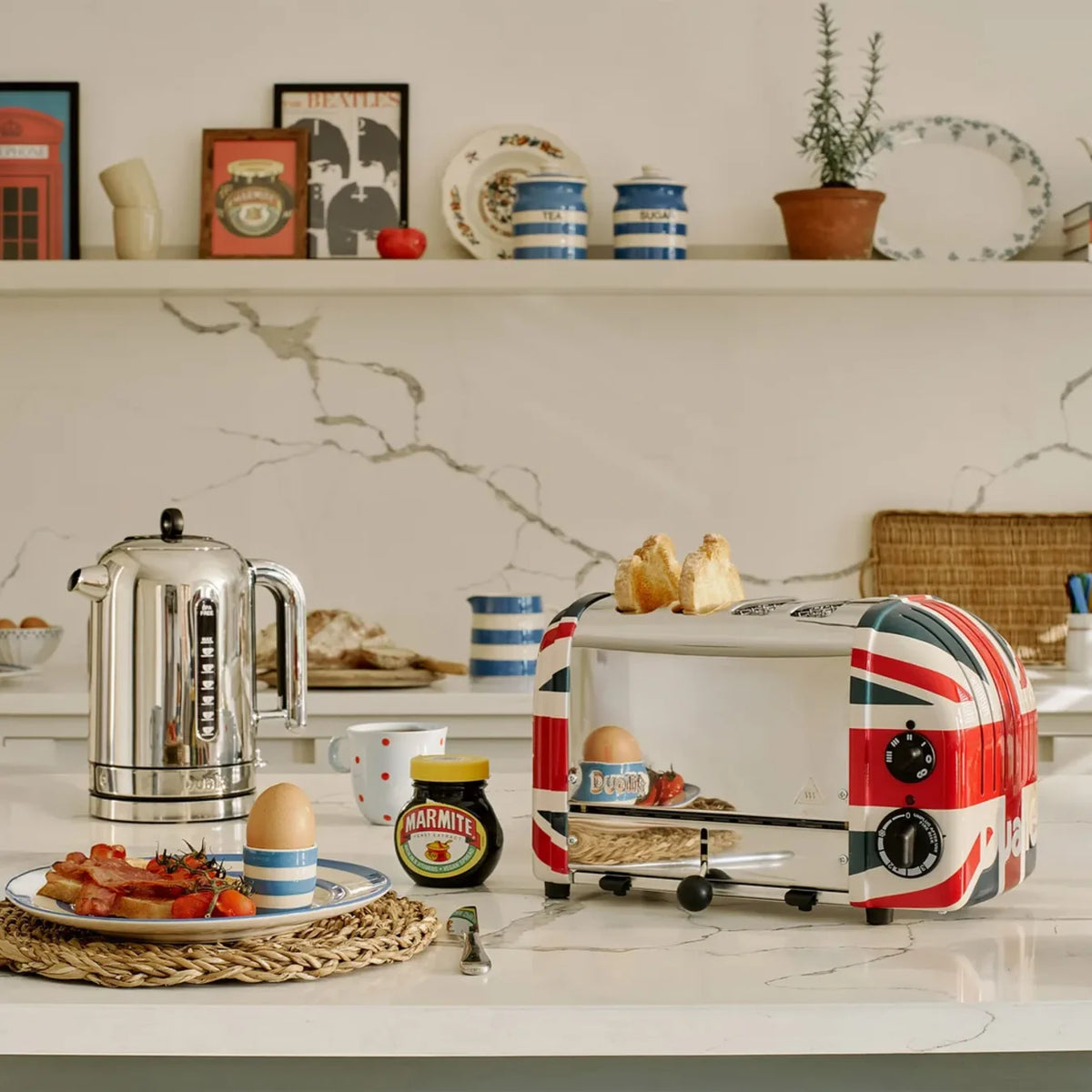 Dualit 47205, in a kitchen beside a kettle and a breakfast plate