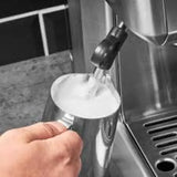 Gastroback 42623, frothing milk in a steel jug with the steam wand