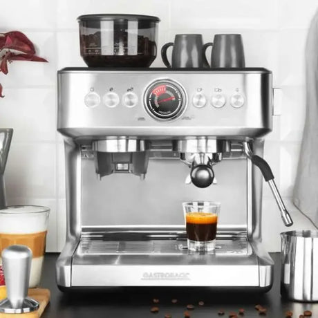 Gastroback 42626, on a kitchen counter with espresso glass and cups