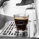 Gastroback 42626, close-up of espresso pouring into a glass on the drip tray