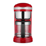 KitchenAid 5KCM1209BER in Empire Red, front view with glass jug and steel filter basket