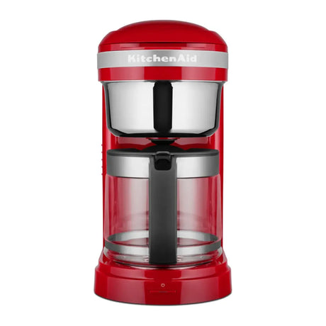 KitchenAid 5KCM1209BER in Empire Red, front view with glass jug and steel filter basket