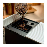 KitchenAid 5KES8453B in Matte Black, coffee beans pouring into the top bean hopper