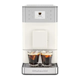 KitchenAid 5KES8453B in Porcelain White, front view with two glasses of iced coffee