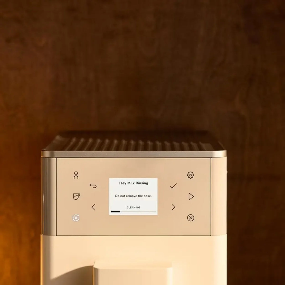 KitchenAid 5KES8453B in Porcelain White, close-up of the touch buttons and cleaning message screen