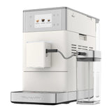 KitchenAid 5KES8454 in Porcelain White, three-quarter view of the light coloured machine with milk jug