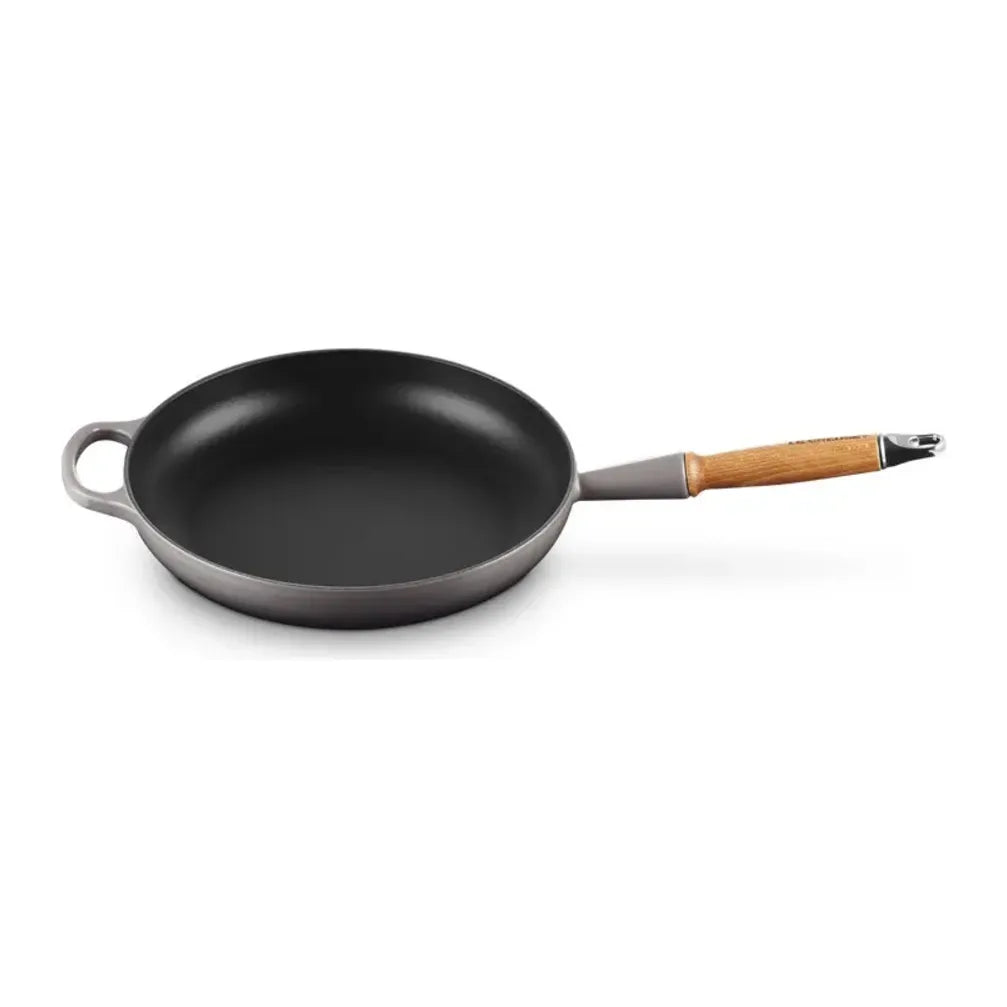 Le Creuset 20258284440422, three-quarter view showing the black interior