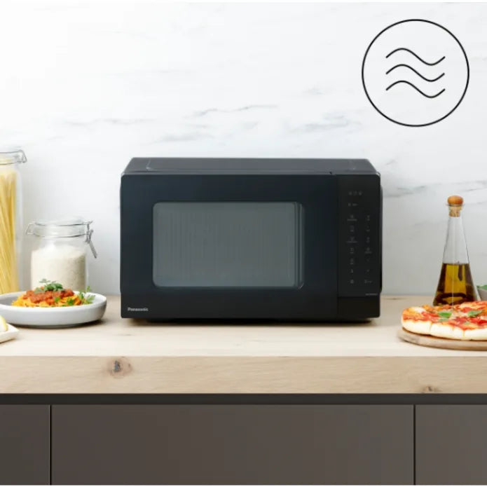 Panasonic NN-K36NBMEPG Microwave Oven in Black, in a room setting