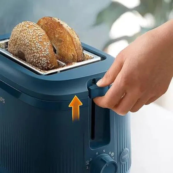 Philips 3000 Series HD2511/70 Toaster in Blue, in use