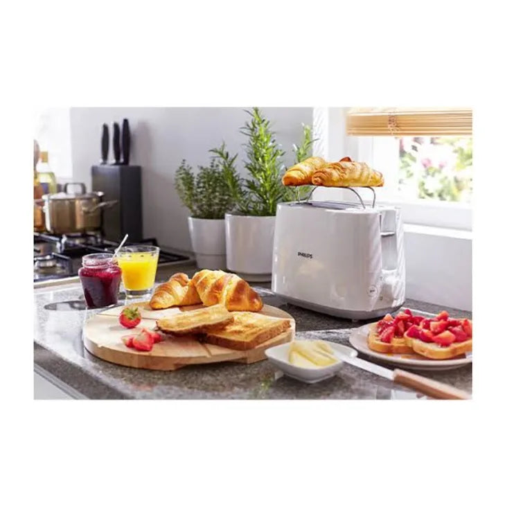 Philips HD2581/00 Toaster in White, in a room setting