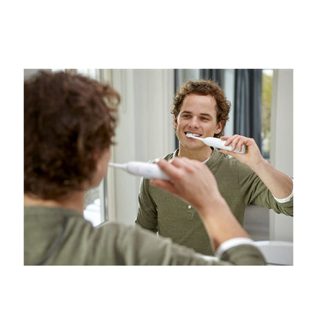Philips Sonicare CleanCare+ HX3212/03 Electric Toothbrush, in use