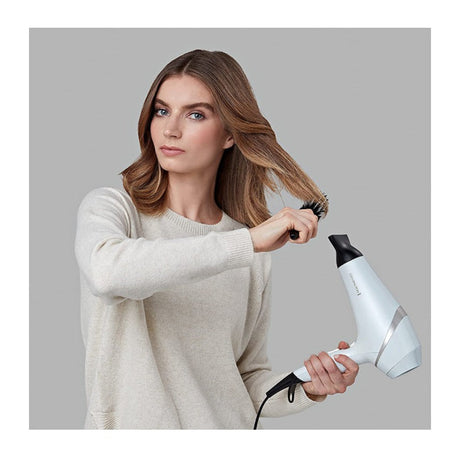 Remington Hydraluxe AC8901 Hair Dryer in White, in use